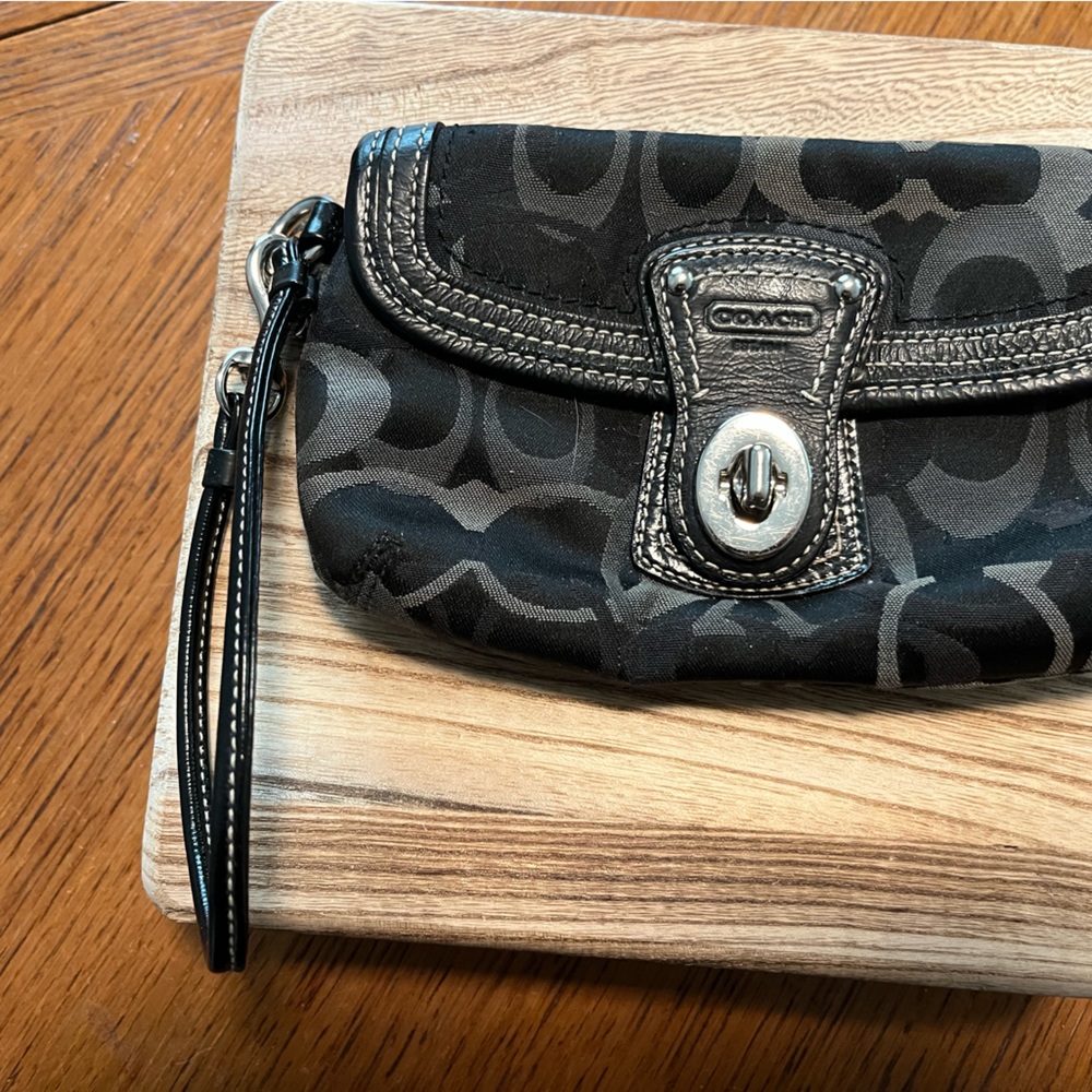 Black Coach toggle closure wristlet.  EUC.